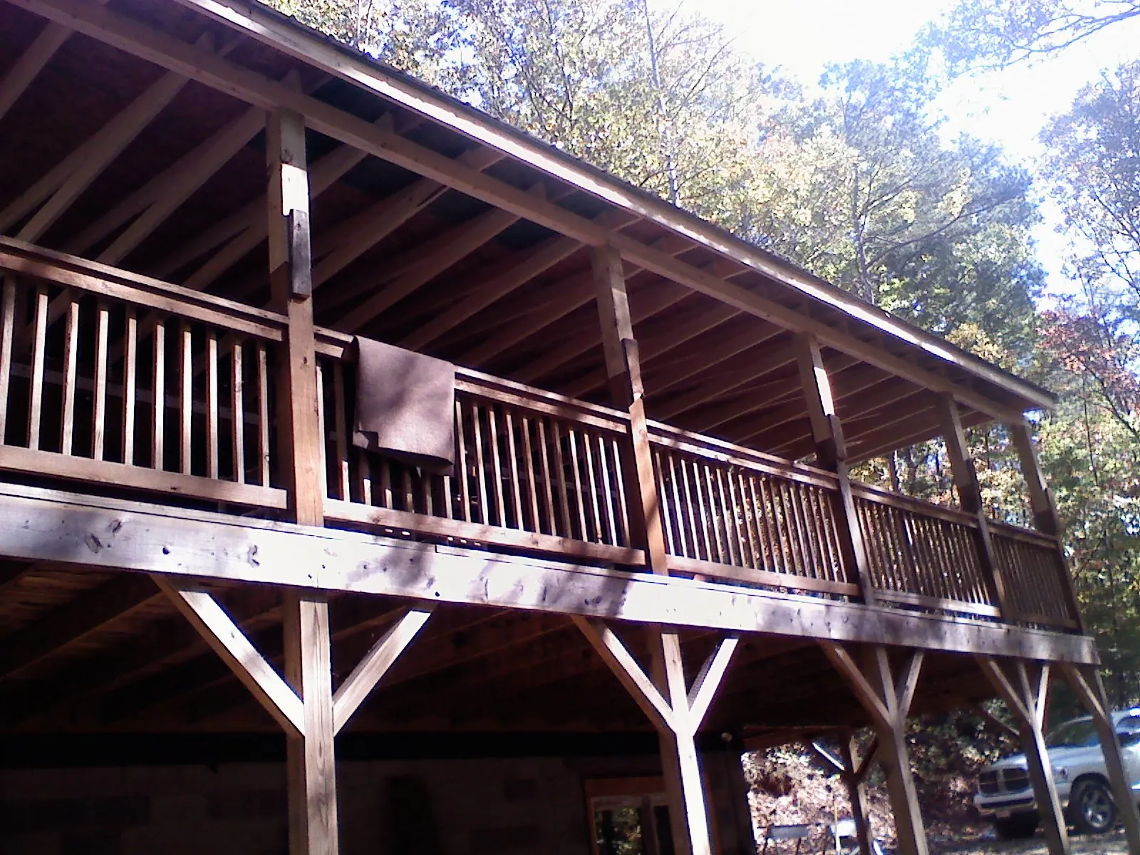 Timber framing under a new elevated porch and deck — Roof Leak Repair in Harveysburg by Roofing Brothers